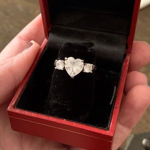 Heart shaped cz ring in silver metal setting